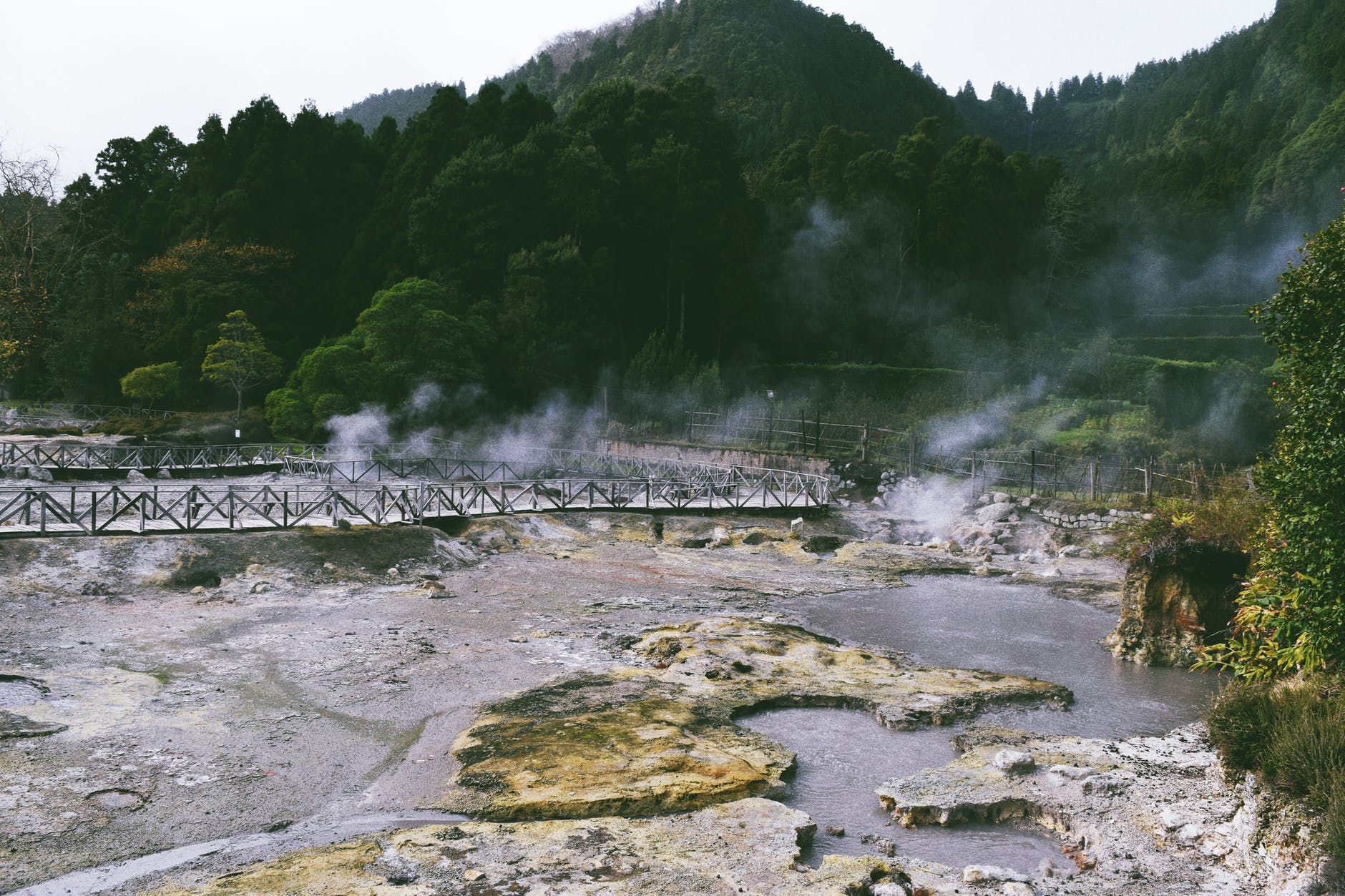 body of water in front of mountain